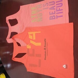 2 Reebok Tanks